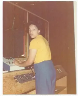 Ms. Kim Paumer on the light show controls 1976 at a Phil LeBash party in York, Pennsylvania 1...webp